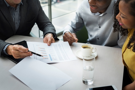 Couple sitting with financial advisor