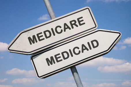 Arrow signs that say Medicare and Medicaid