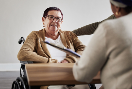 Woman in wheelchair smiling
